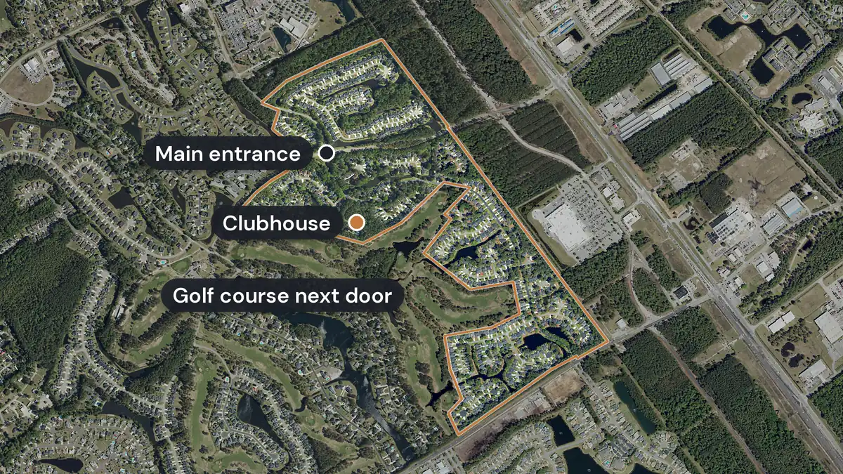 Myrtle Trace from above, with its edge drawn in orange: houses among tall pines and ponds, the clubhouse and main entrance marked, and the golf course next door